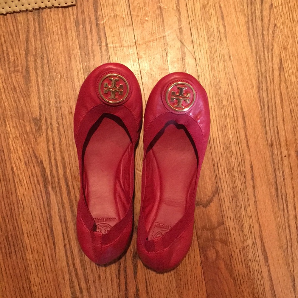 Deep red Tory Burch flats.